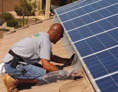 Installing solar panel pigeon protection screening on home